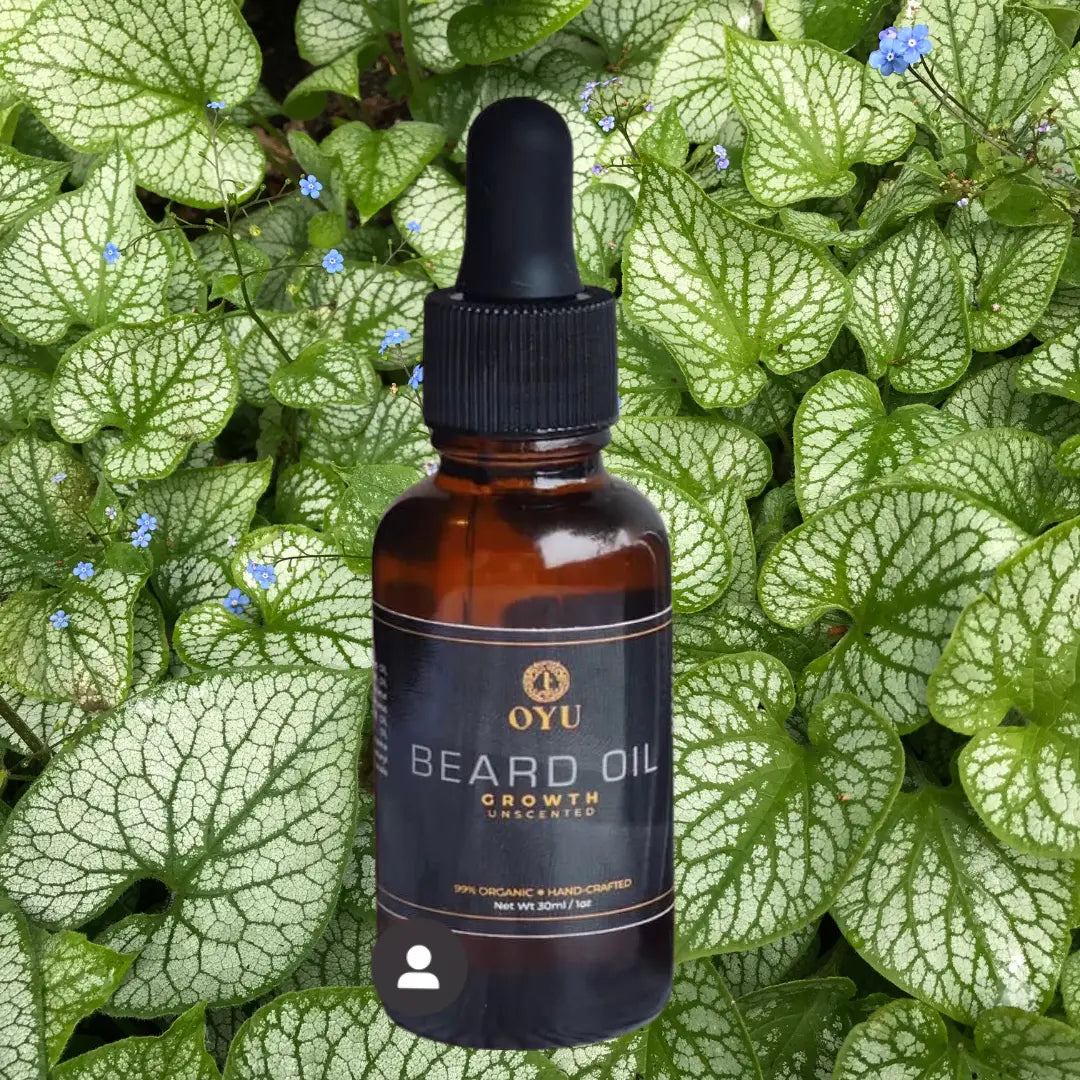 Beard oil surrounded by lush green leaves, applying Oyu Cosmetics Growth Beard Oil, embracing nature while caring for his beard.